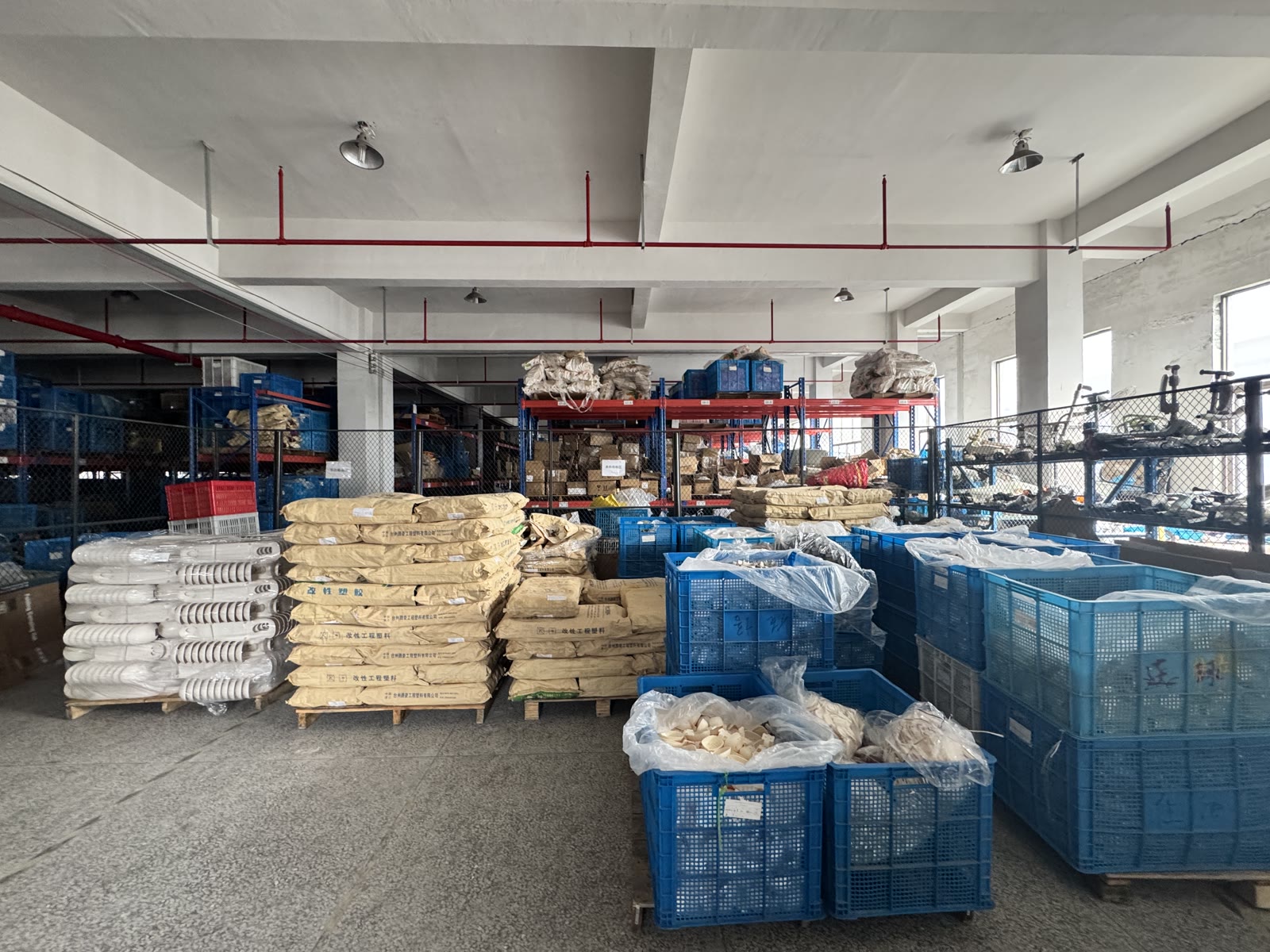 Organized storage area for semi-finished scooter parts and production materials